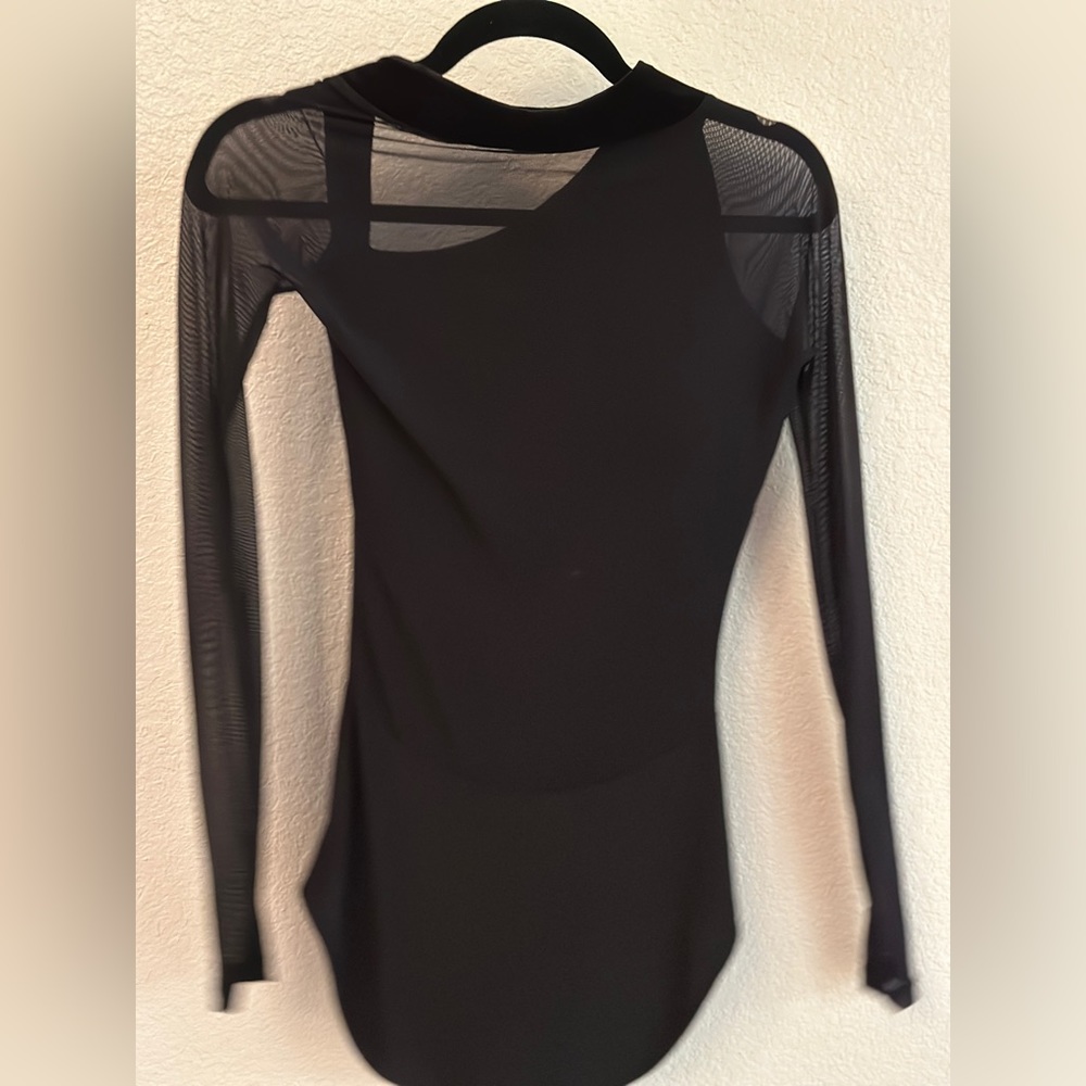 Sexy body suit.  new with no tags.  Never worn.